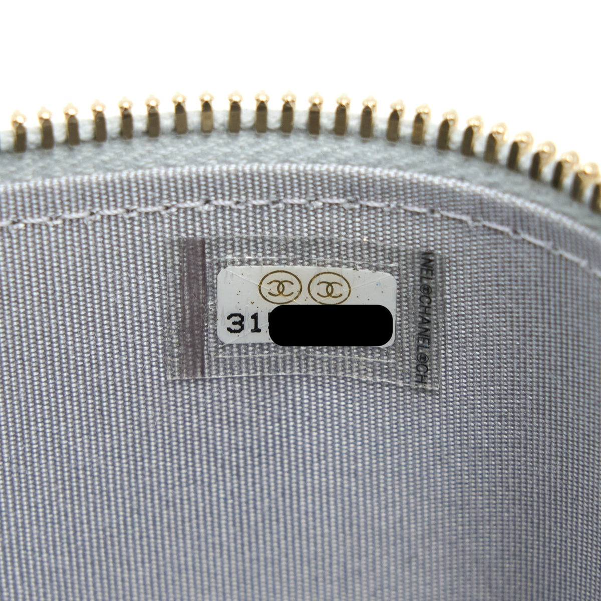 chanel-21a-top-handle-mini-vanity-with-chain-lambskin-light-grey-ghw