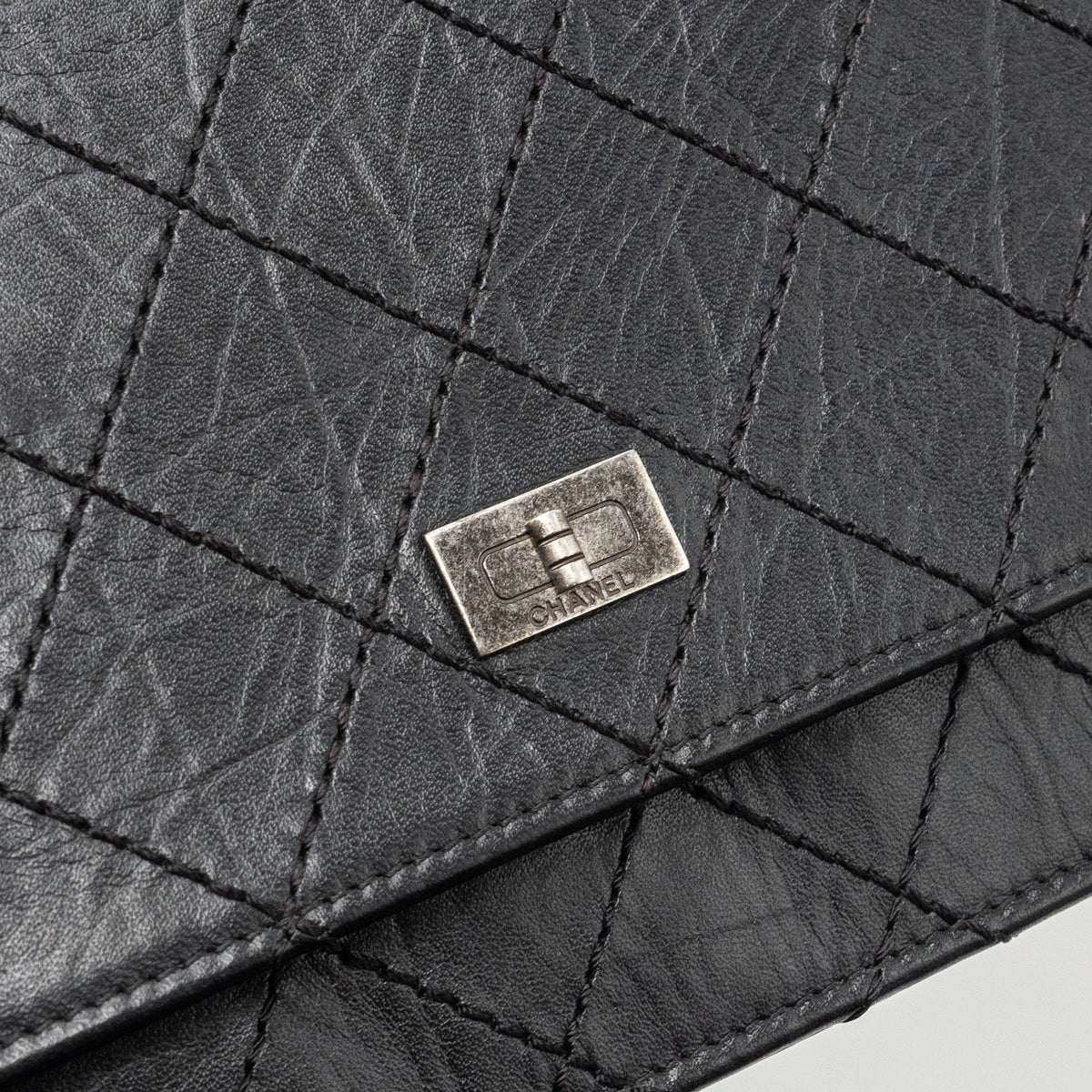 chanel-2-55-reissue-wallet-on-chain-calfskin-black-ruthenium-hardware