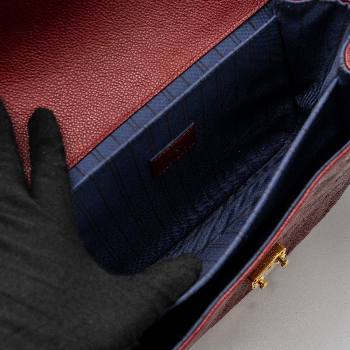 louis-vuitton-pochette-metis-monogram-empreinte-red-ghw