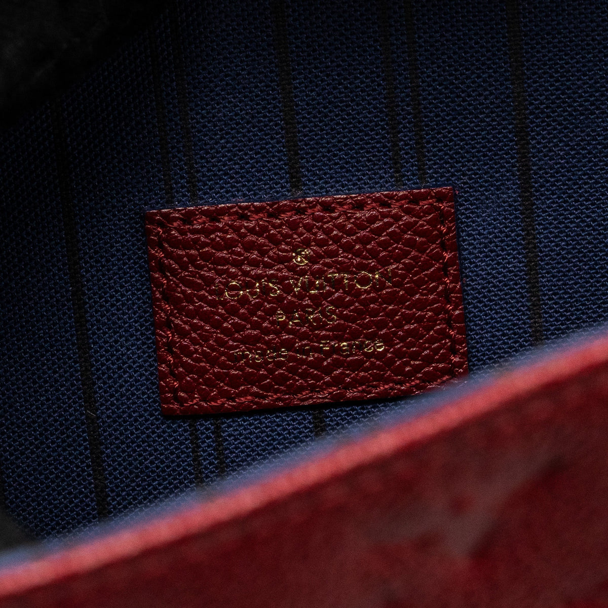 louis-vuitton-pochette-metis-monogram-empreinte-red-ghw