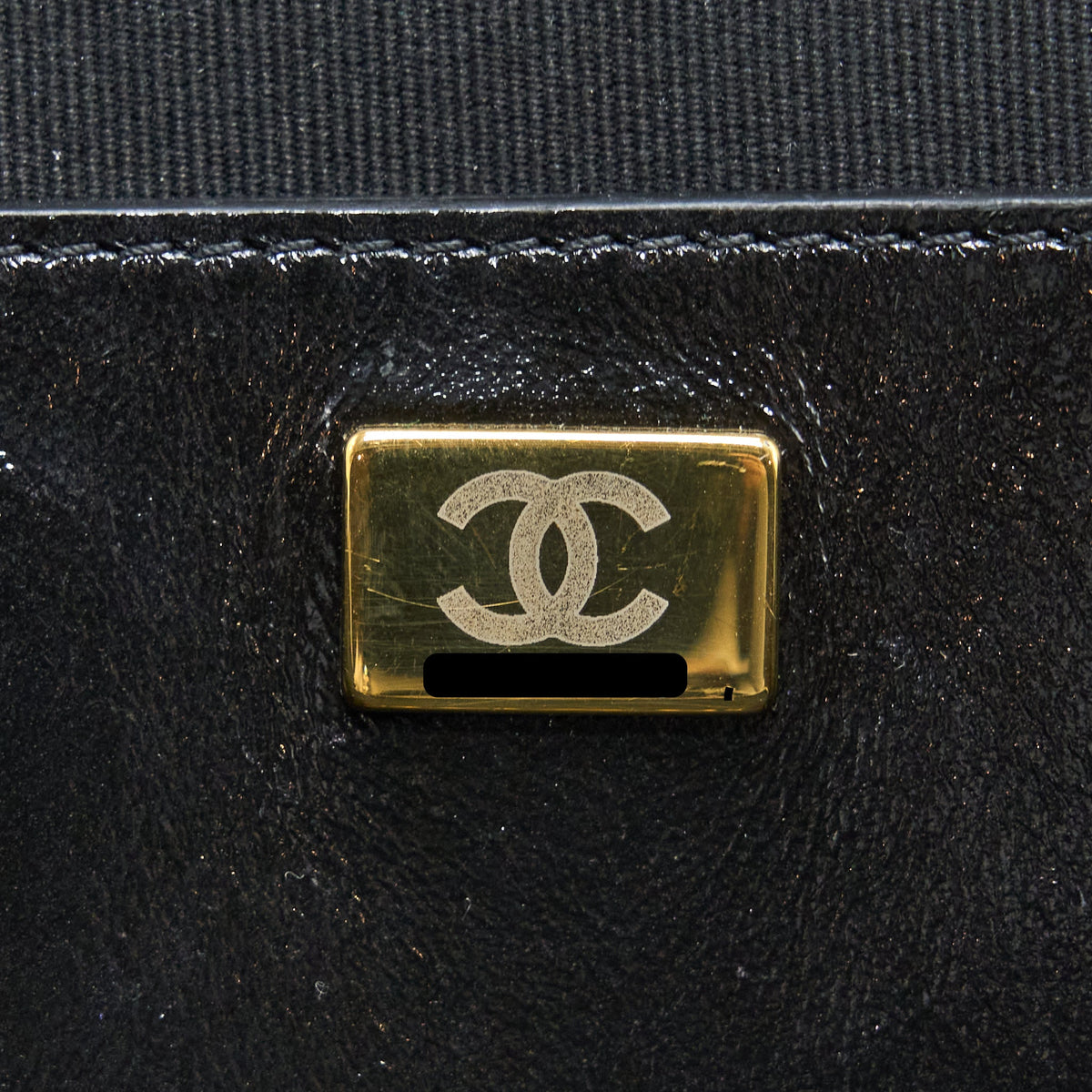 chanel-22a-quilted-backpack-shiny-calfskin-black-lghw