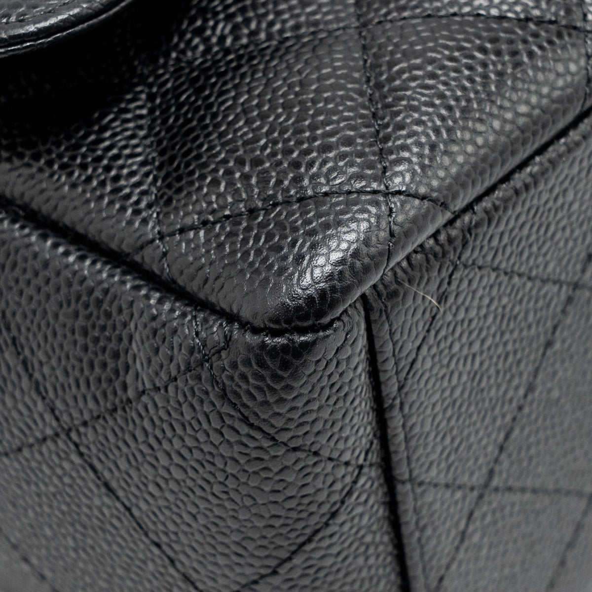 chanel-maxi-classic-double-flap-bag-caviar-black-ghw-1