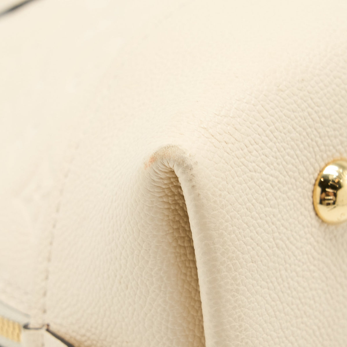 louis-vuitton-neo-alma-pm-monogram-empreinte-white-ghw
