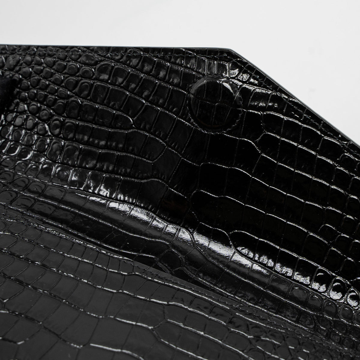 saint-laurent-ysl-uptown-pouch-croc-embossed-calfskin-black-shw