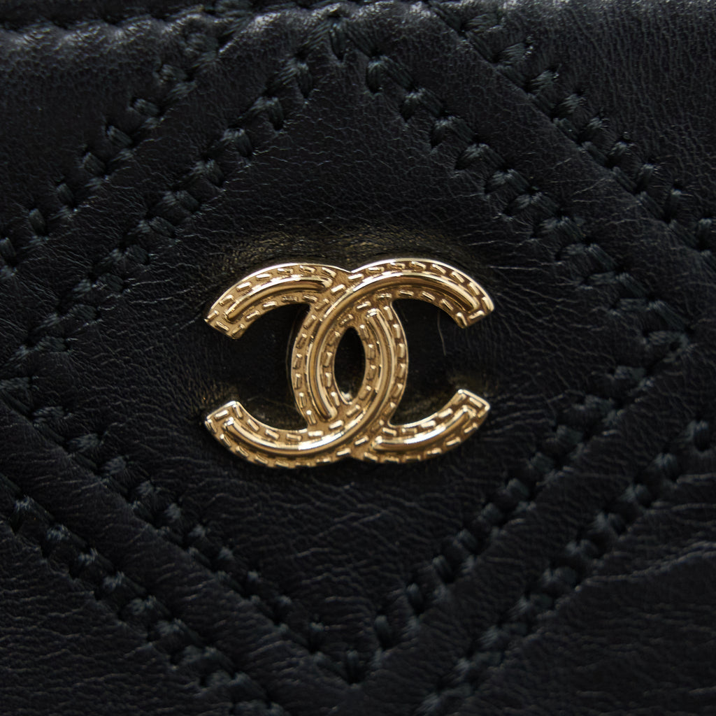 chanel-quilted-pouch-with-tassel-black-lghw