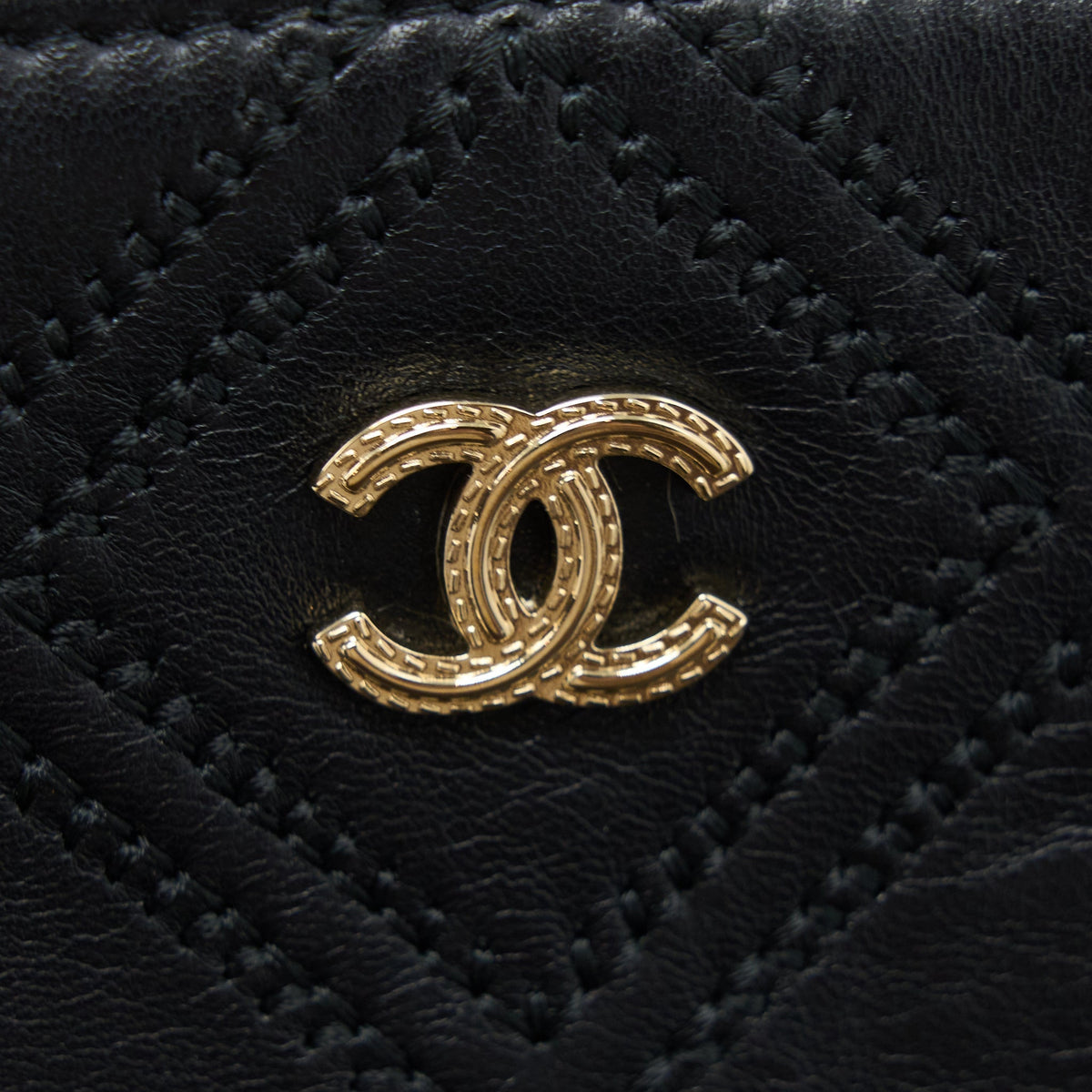 chanel-quilted-pouch-with-tassel-black-lghw