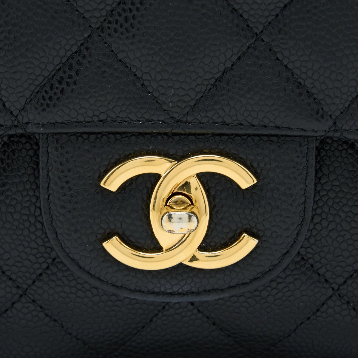 chanel-maxi-classic-double-flap-bag-caviar-black-ghw