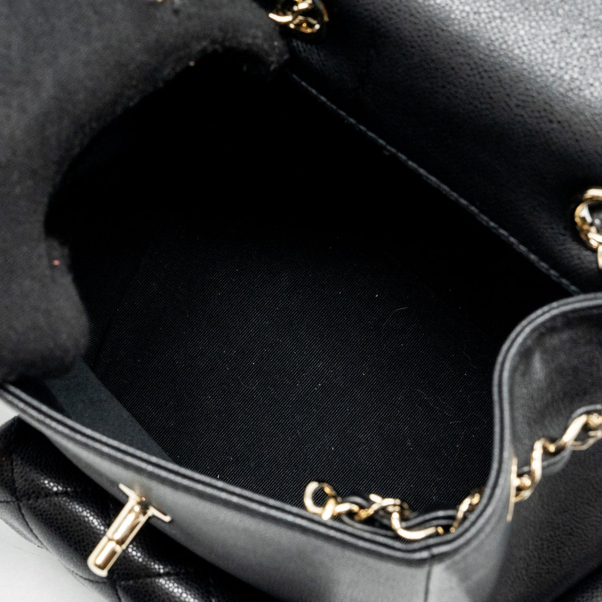 chanel-23k-triple-pocket-backpack-caviar-black-lghw-microchip