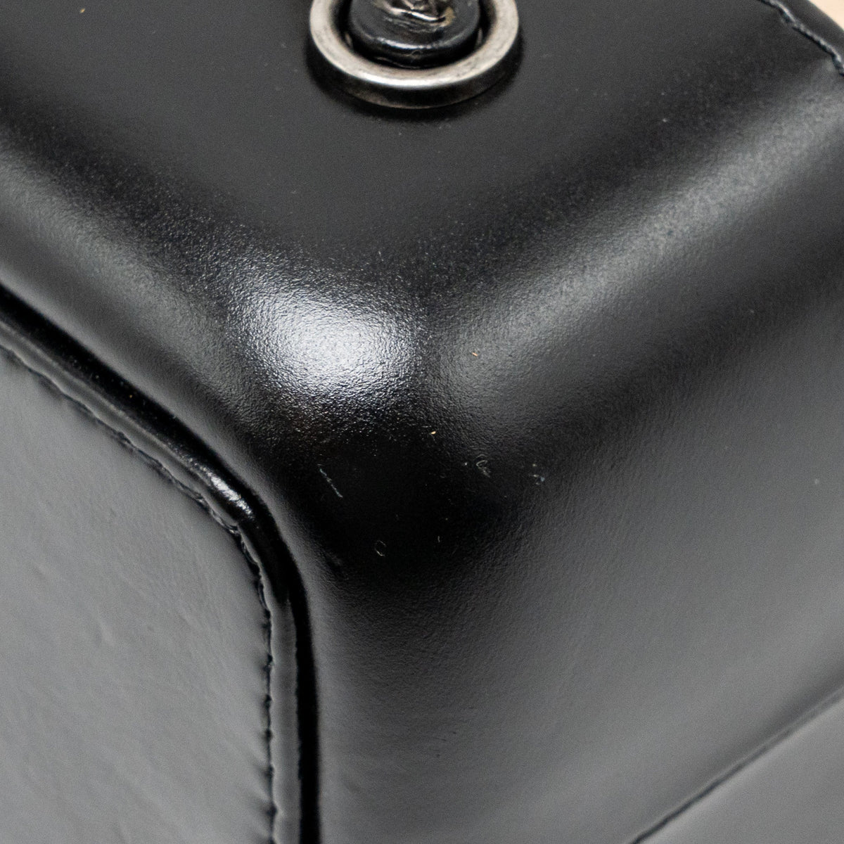 chanel-small-gabrielle-backpack-aged-calfskin-beige-black-multicolour-hardware-1