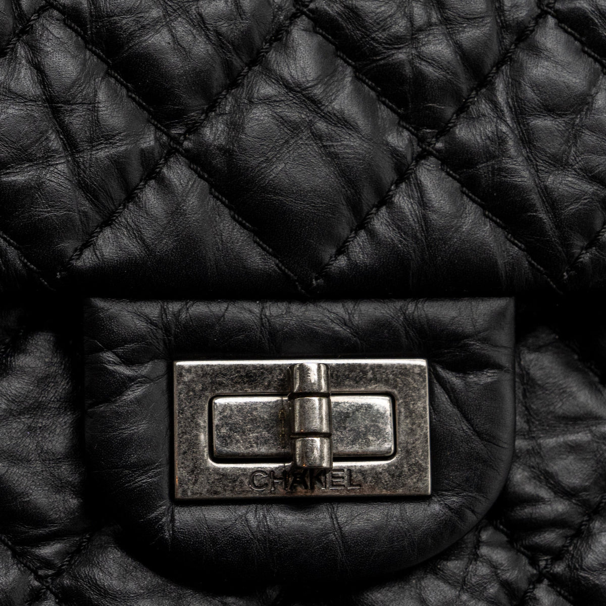 chanel-small-2-55-reissue-flap-bag-aged-calfskin-black-ruthenium-shw