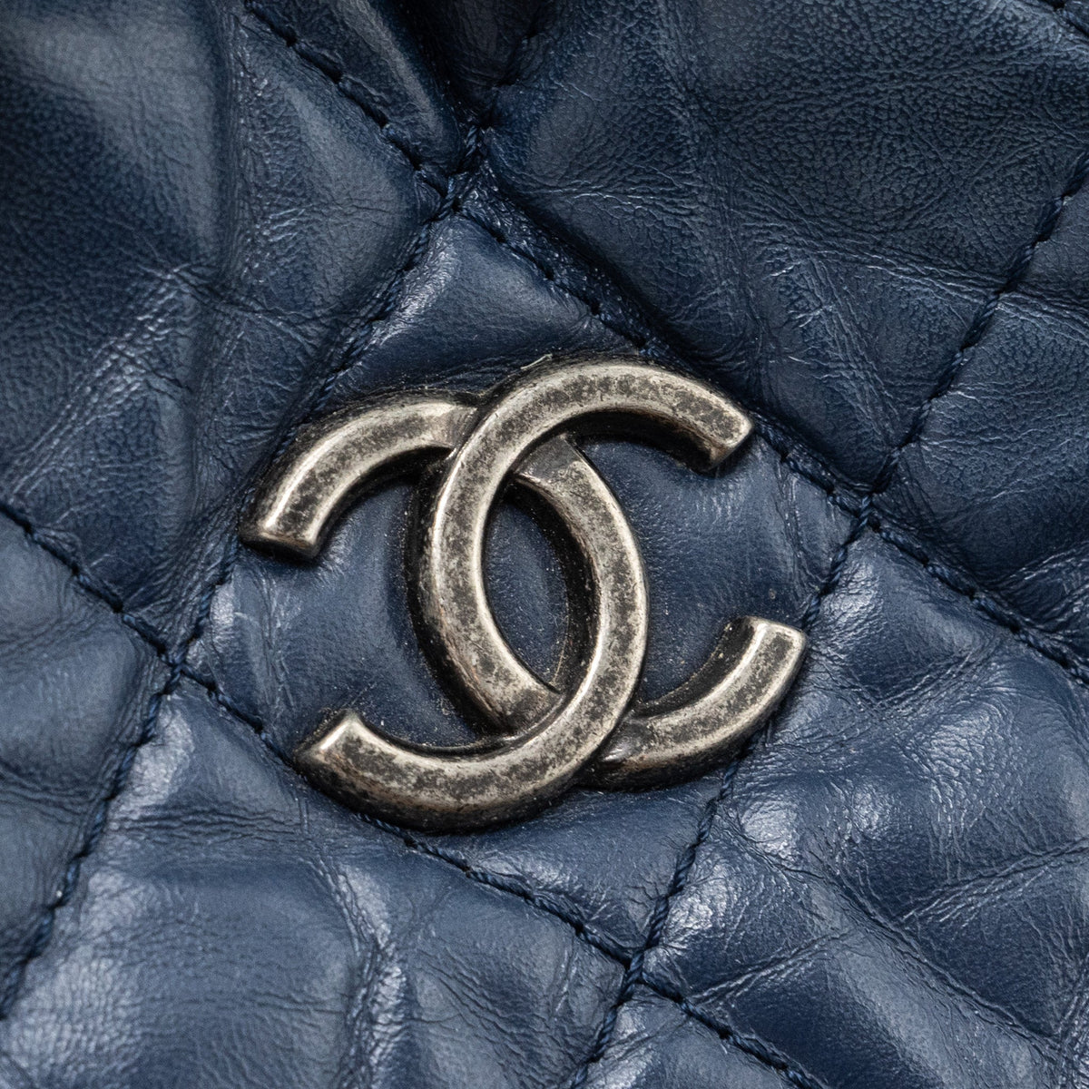 chanel-small-gabrielle-backpack-aged-calfskin-navy-blue-black-ruthenium-hardware