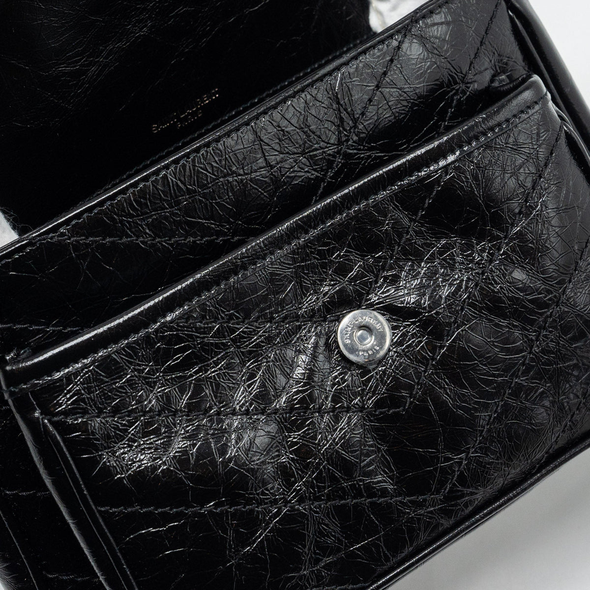 saint-laurent-niki-baby-leather-black-black-shw