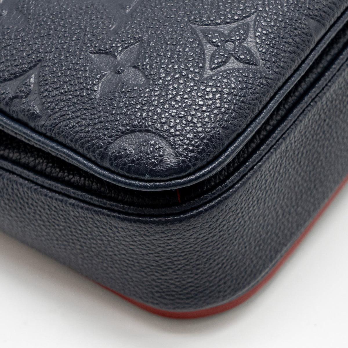 louis-vuitton-pochette-metis-monogram-empreinte-marine-rouge-ghw-copy