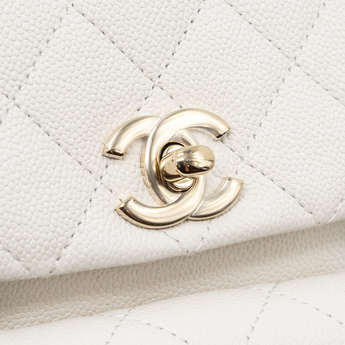 copy-of-chanel-23k-triple-pocket-mini-backpack-caviar-white-lghwmicrochip