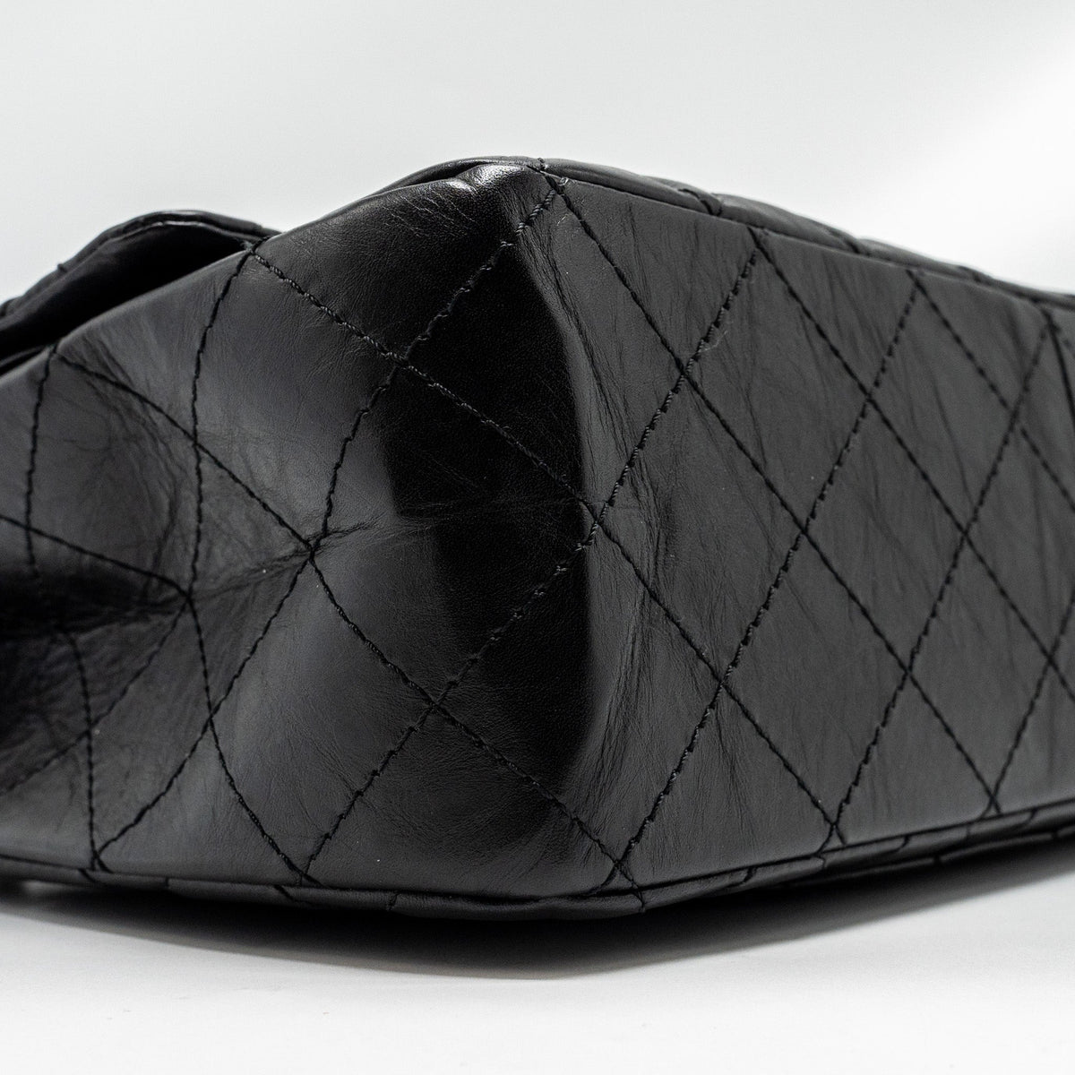 chanel-maxi-2-55-reissue-flap-bag-aged-calfskin-black-ghw-1