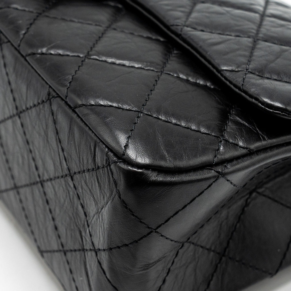 chanel-maxi-2-55-reissue-flap-bag-aged-calfskin-black-ghw-1