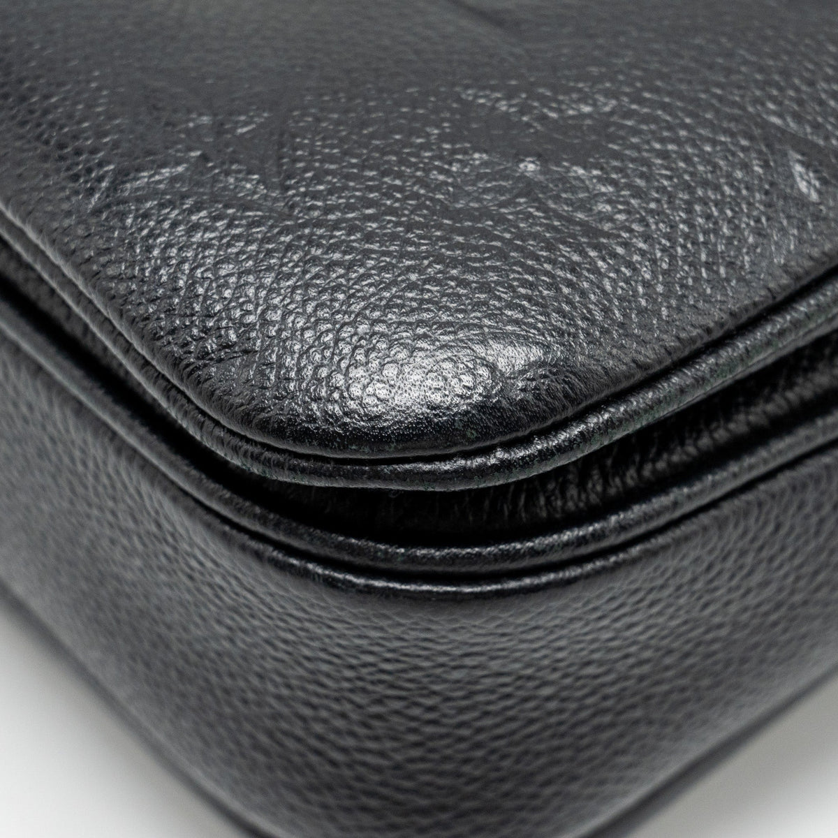 louis-vuitton-pochette-metis-monogram-empreinte-black-ghw-7