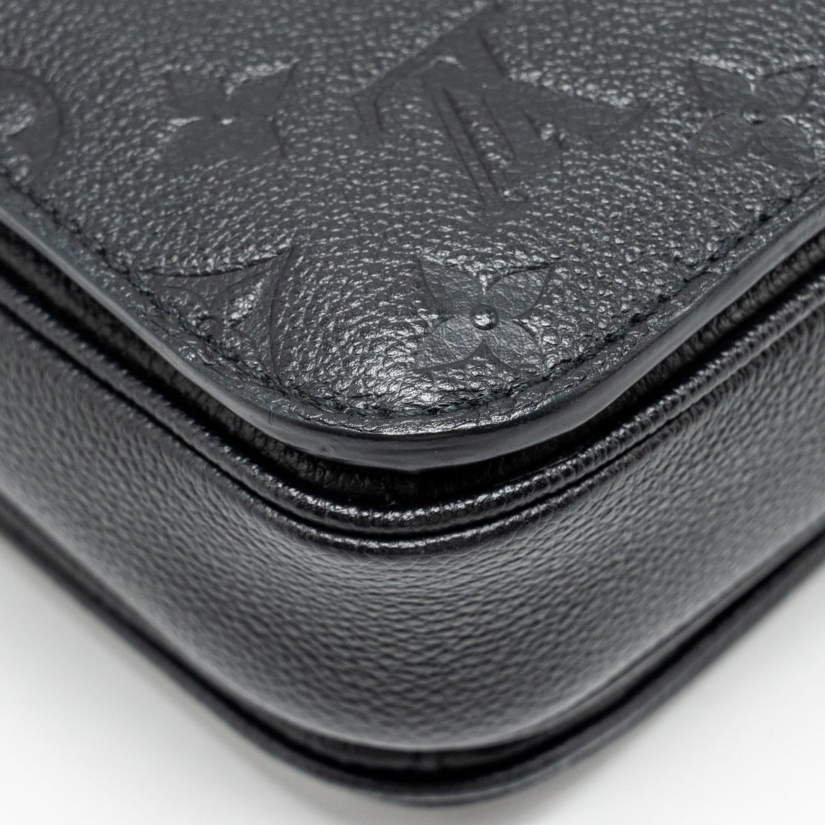 louis-vuitton-pochette-metis-monogram-empreinte-black-ghw-7