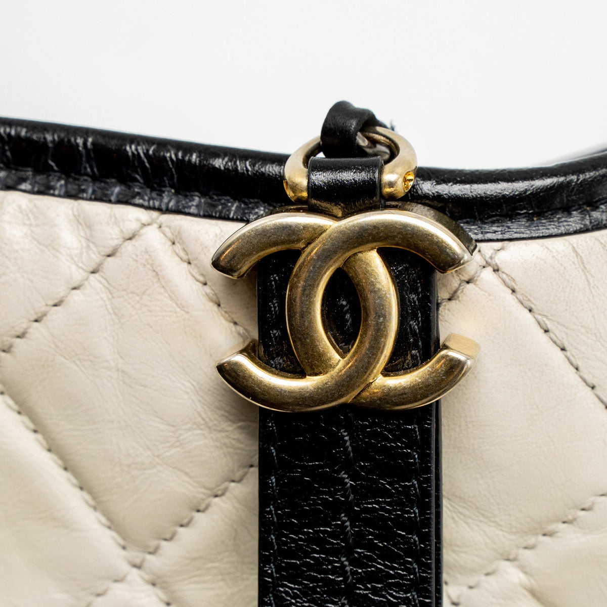 chanel-small-gabrielle-hobo-bag-aged-calfskin-white-black-multicolour-hardware