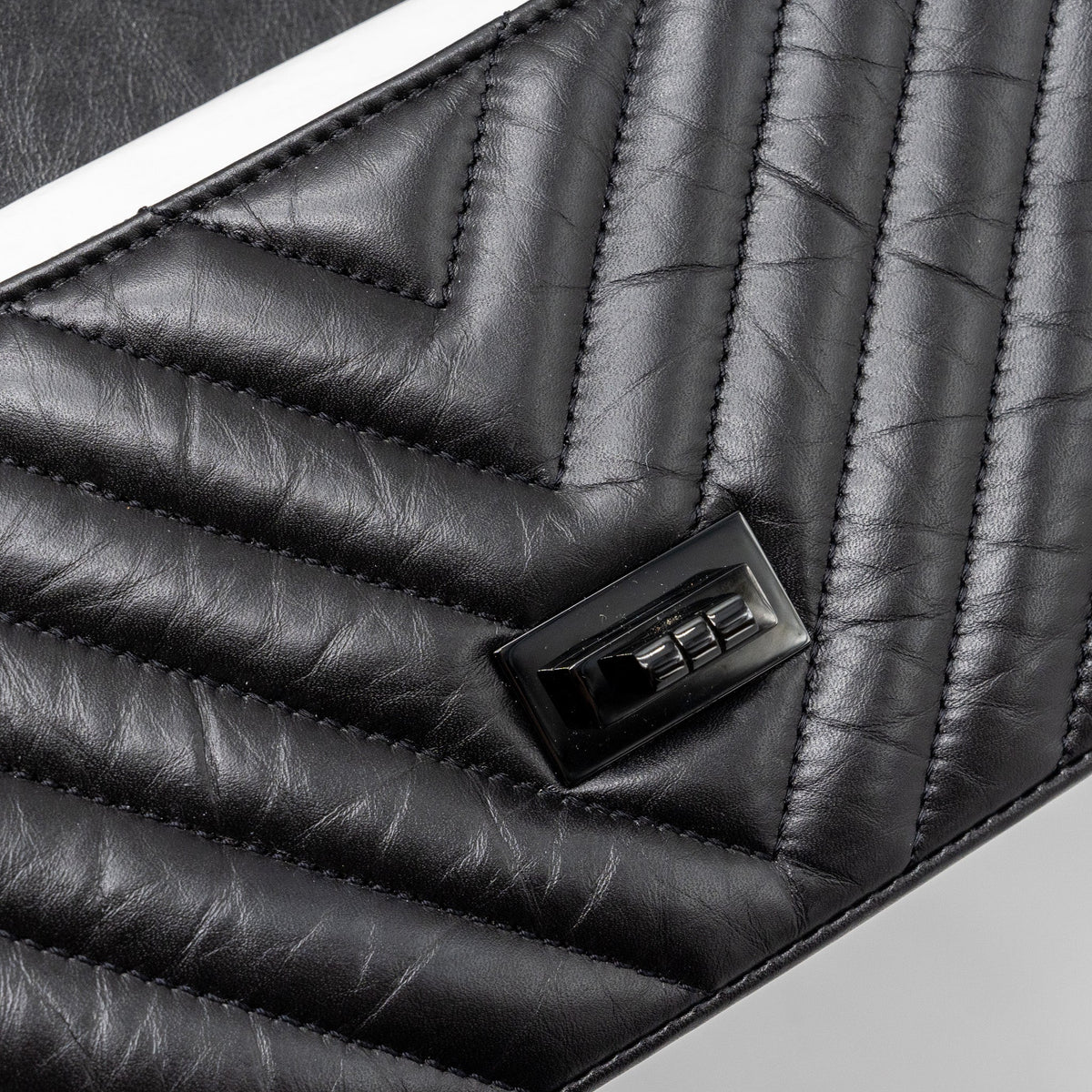 copy-of-chanel-mini-2-55-reissue-flap-bag-chevron-calfskin-so-black