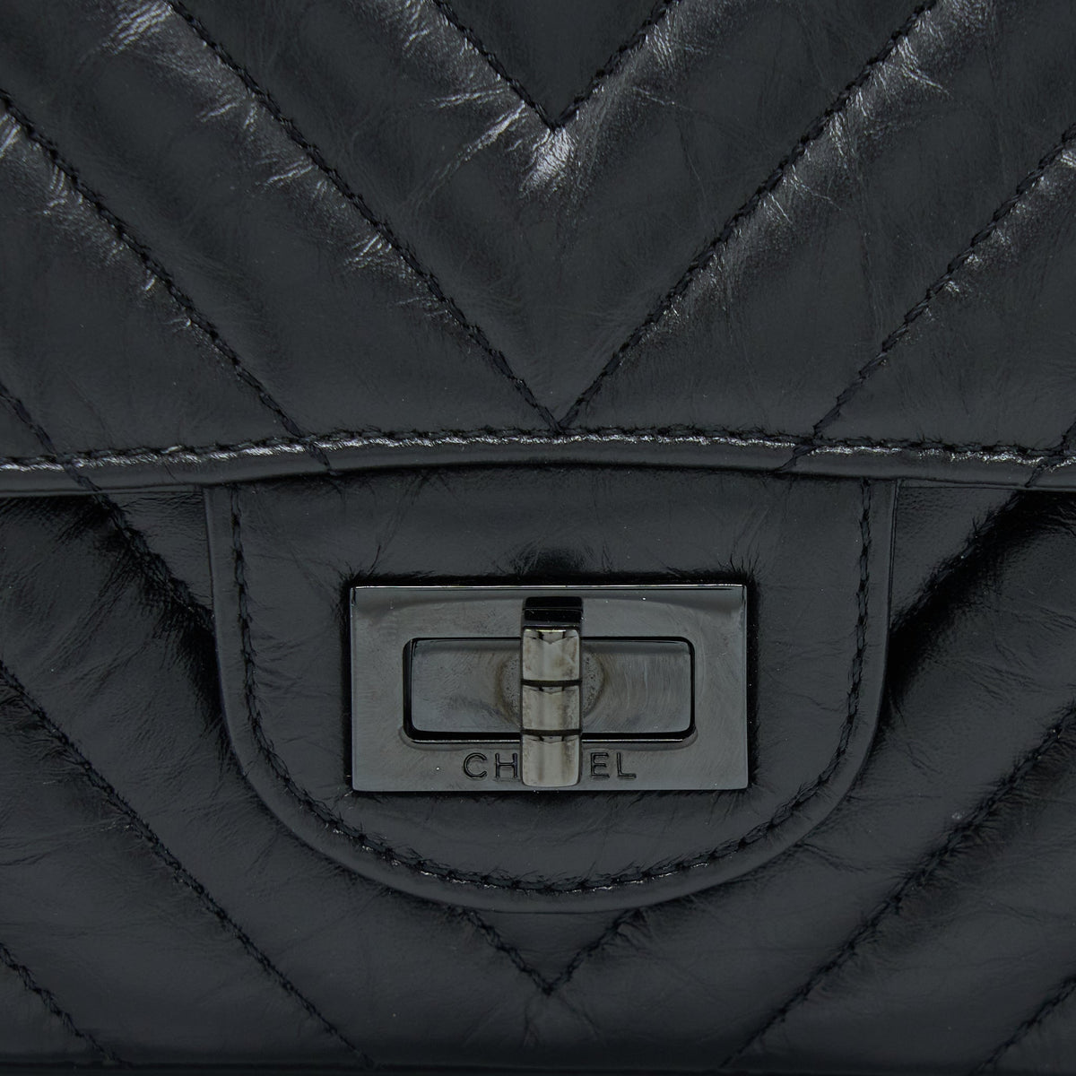 chanel-mini-reissue-2-55-flap-bag-chevron-aged-calfskin-so-black