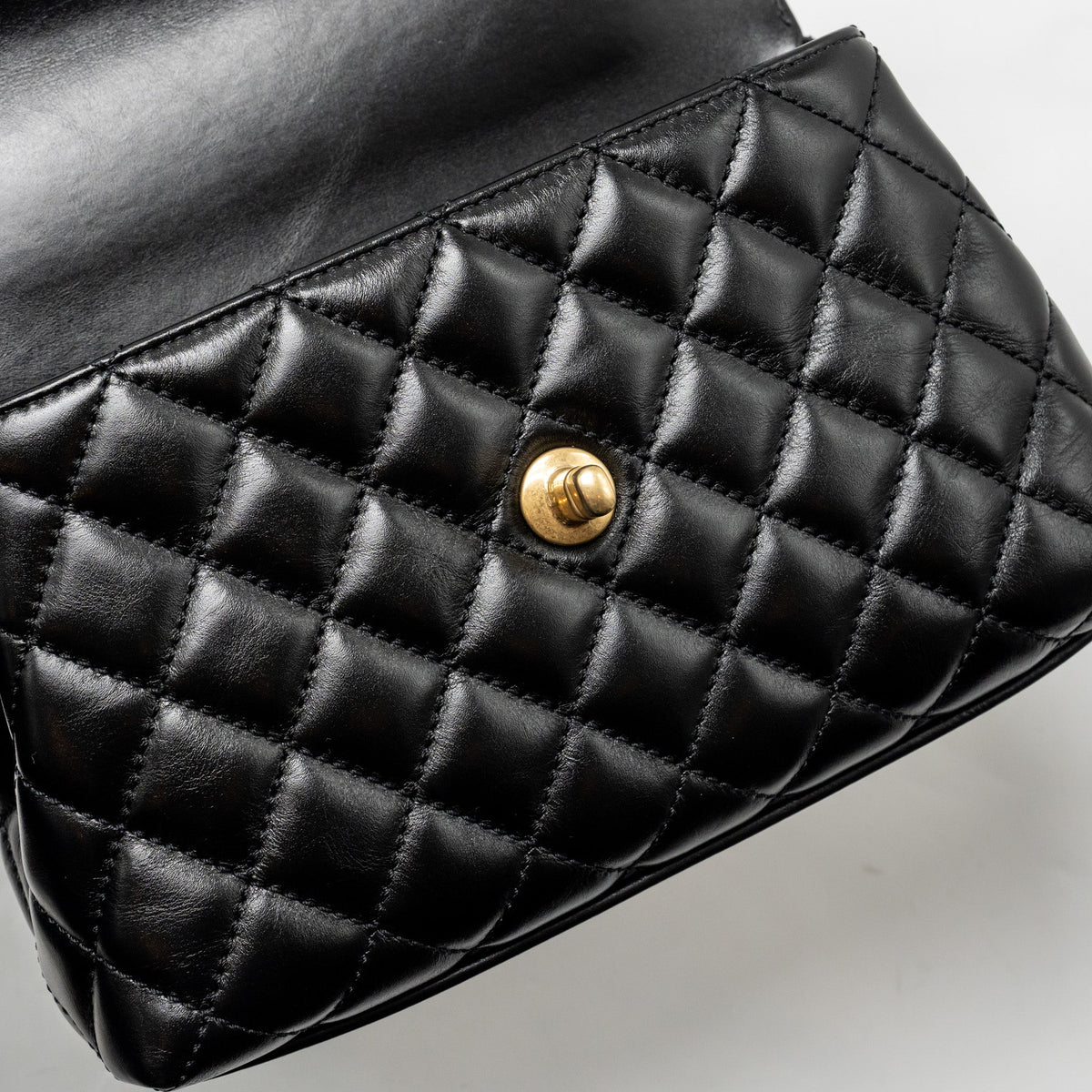 chanel-detailed-metal-handle-small-coco-handle-flap-bag-calfskin-black-ghw-microchip