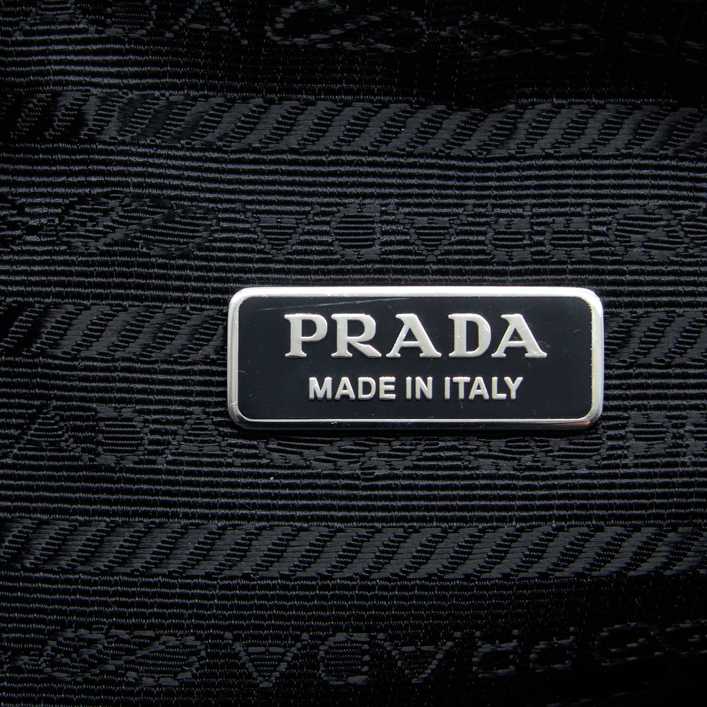 prada-triangle-shoulder-bag-leather-black-shw