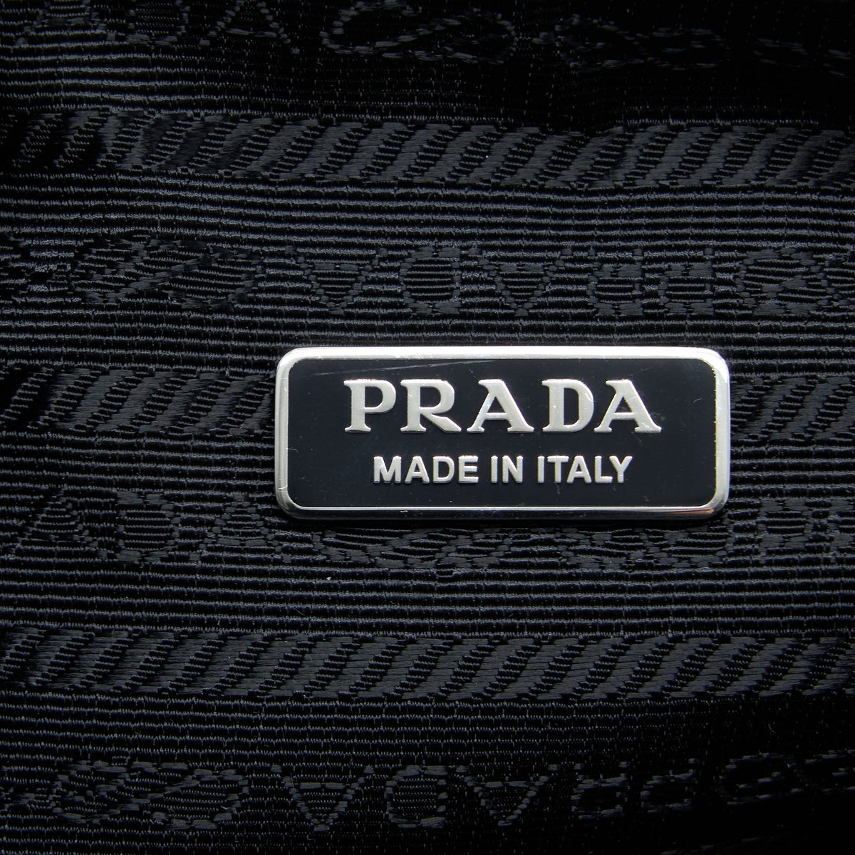 prada-triangle-shoulder-bag-leather-black-shw
