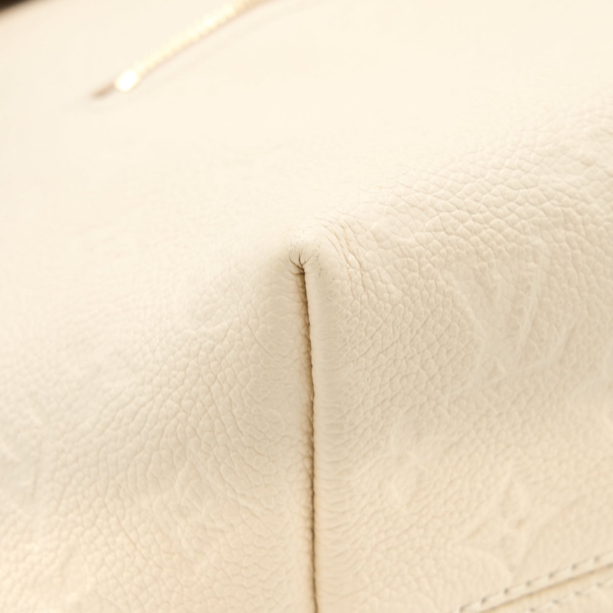louis-vuitton-montsouris-monogram-empreinte-cream-ghw