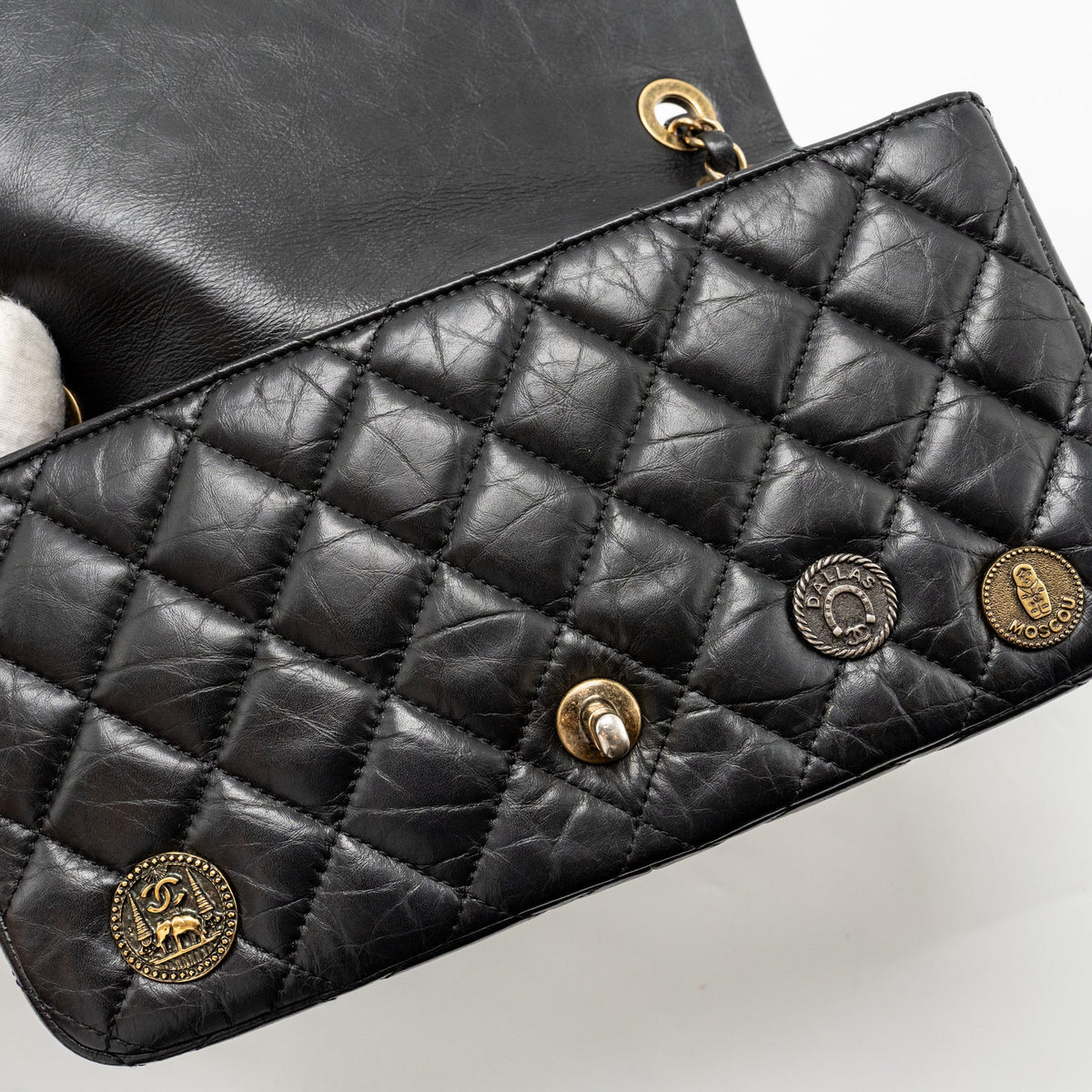 chanel-medallion-quilted-flap-bag-aged-calfskin-black-multicolour-hardware