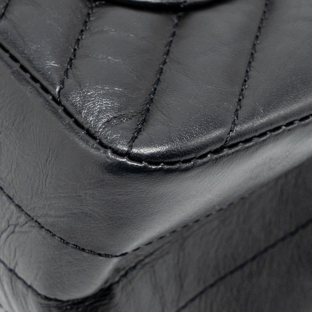 chanel-mini-2-55-reissue-flap-bag-chevron-aged-calfskin-so-black