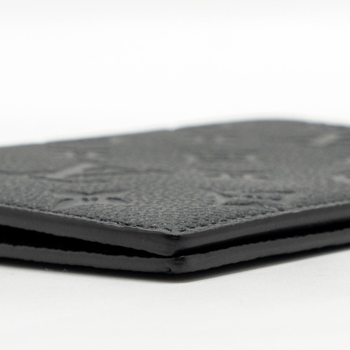 louis-vuitton-passport-cover-monogram-empreinte-leather-black