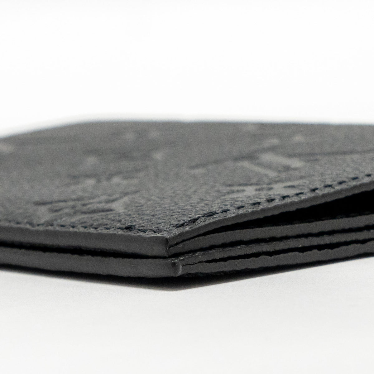 louis-vuitton-passport-cover-monogram-empreinte-leather-black