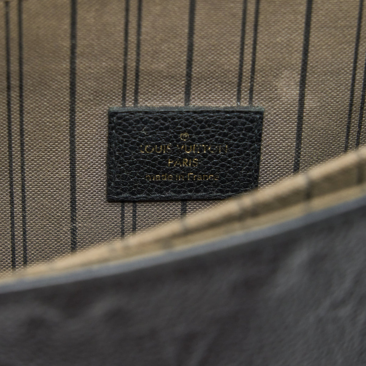 louis-vuitton-pochette-metis-monogram-empreinte-black-ghw-4