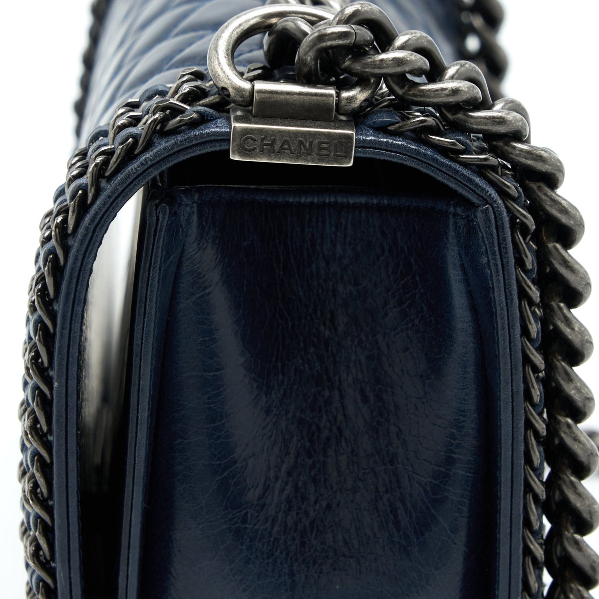 chanel-medium-boy-bag-limited-edition-with-chain-edge-aged-calfskin-navy-ruthenium-hardware