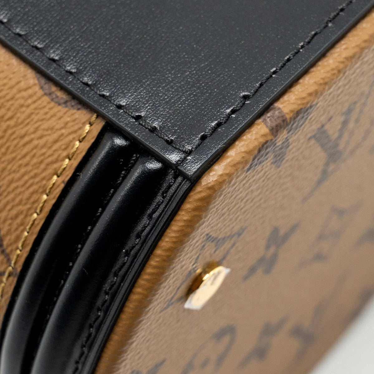 louis-vuitton-cannes-monogram-reverse-canvas-ghw-10