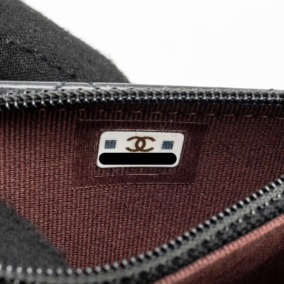 chanel-mini-2-55-reissue-wallet-on-chain-aged-calfskin-black-ghwmicrochip