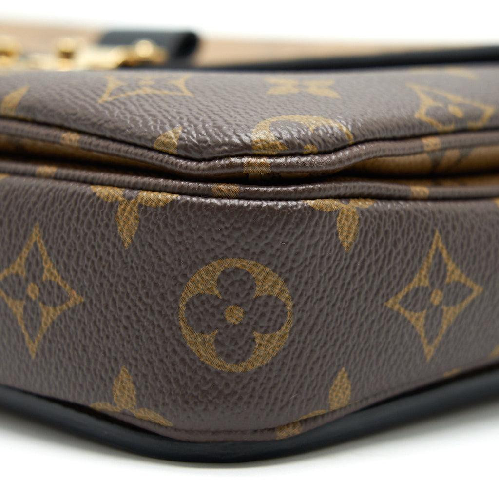 louis-vuitton-pochette-metis-monogram-reverse-canvas-1