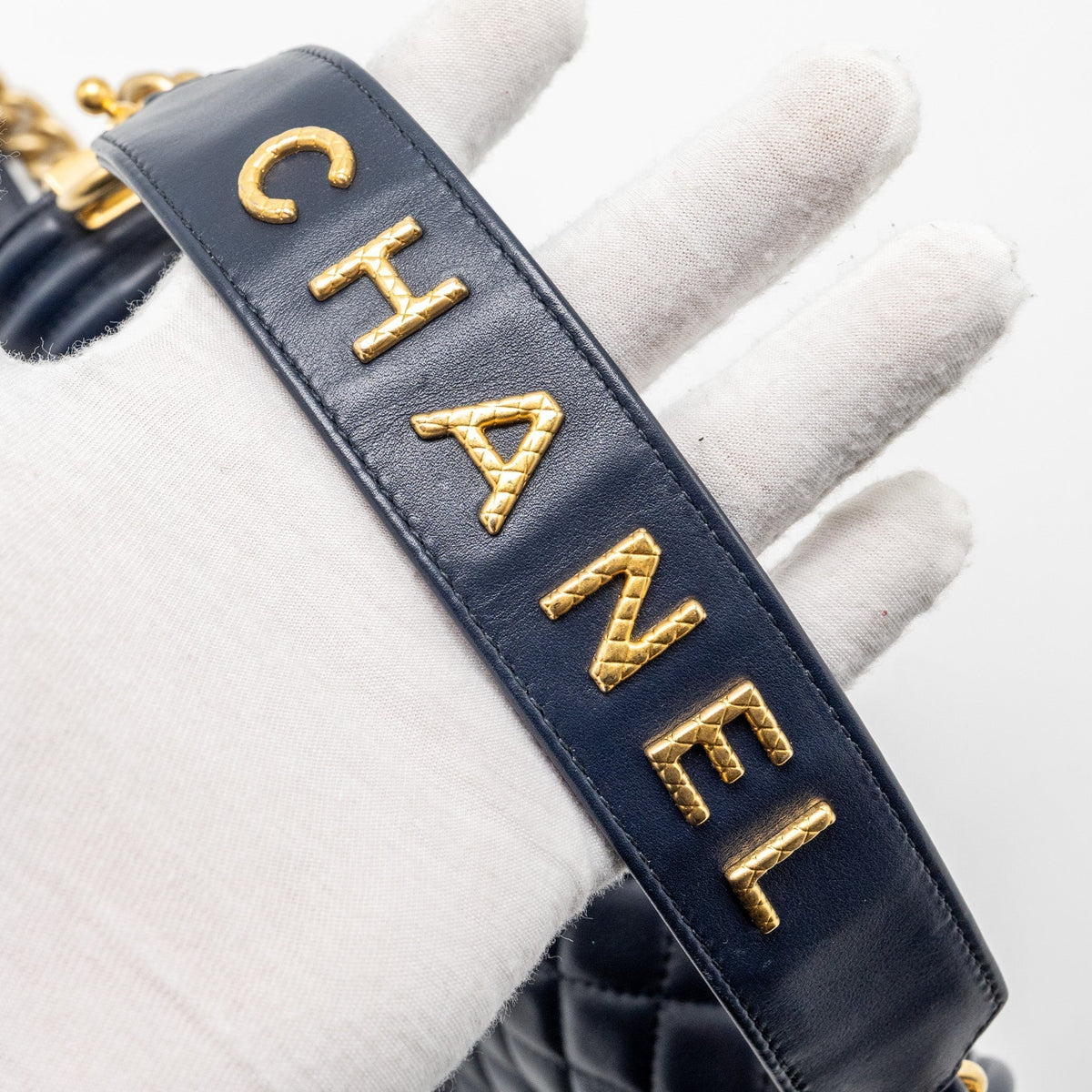chanel-20b-medium-boy-bag-with-top-handle-calfskin-navy-ghw