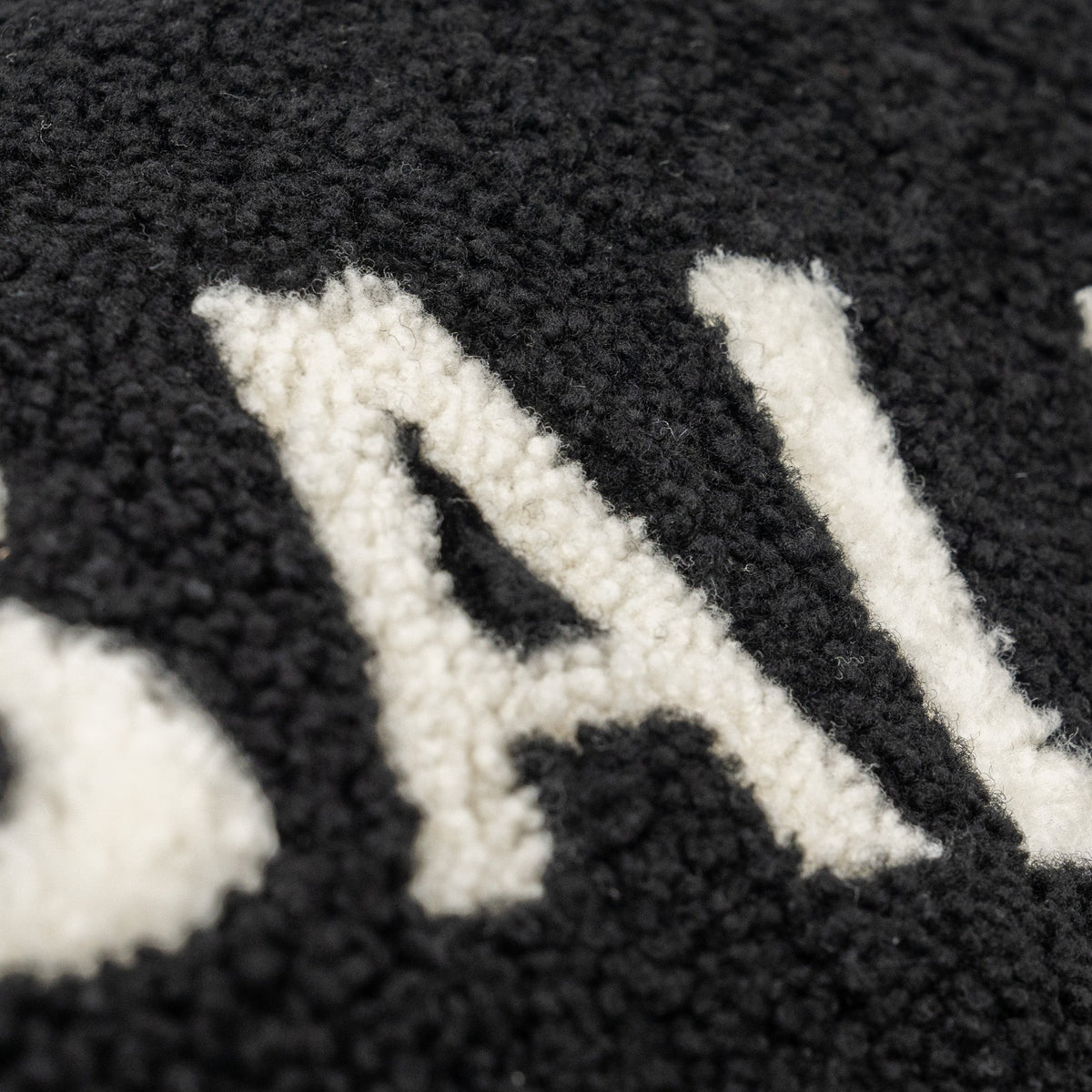 balenciaga-zip-pouch-clutch-shearling-black-white