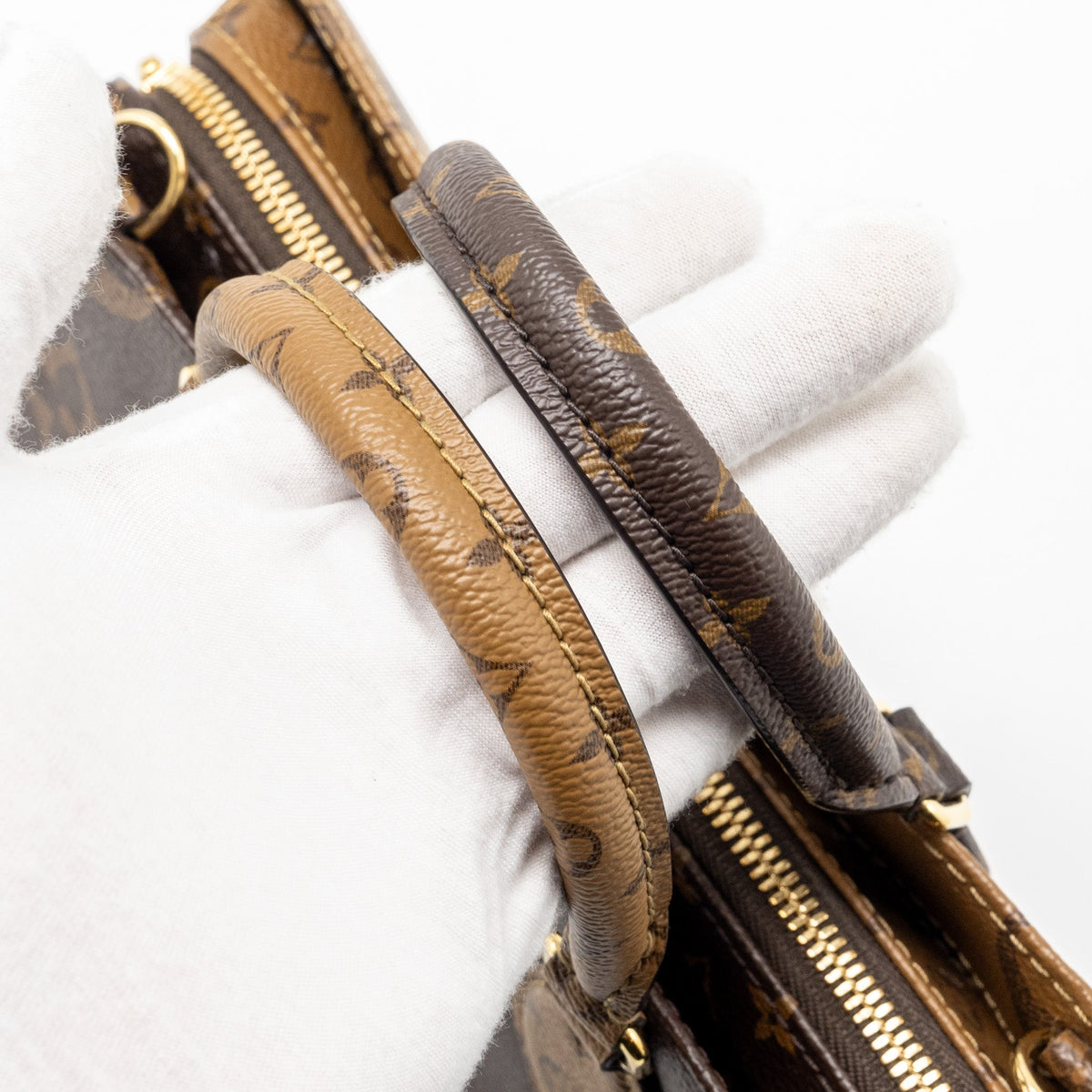 louis-vuitton-onthego-east-west-monogram-reverse-ghw