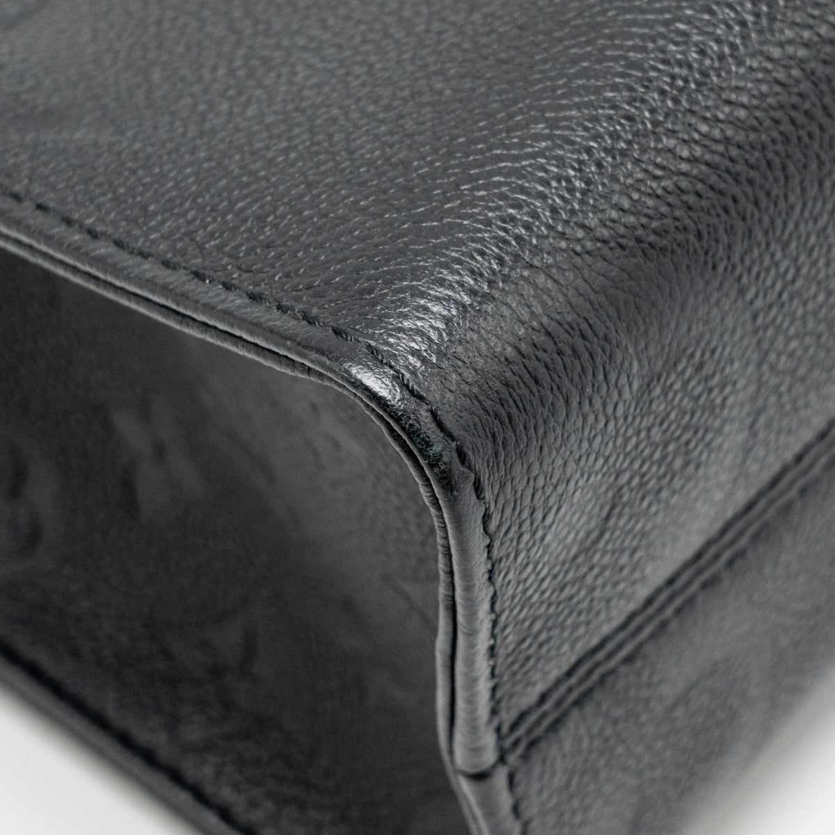 louis-vuitton-onthego-pm-monogram-empreinte-leather-black-ghw