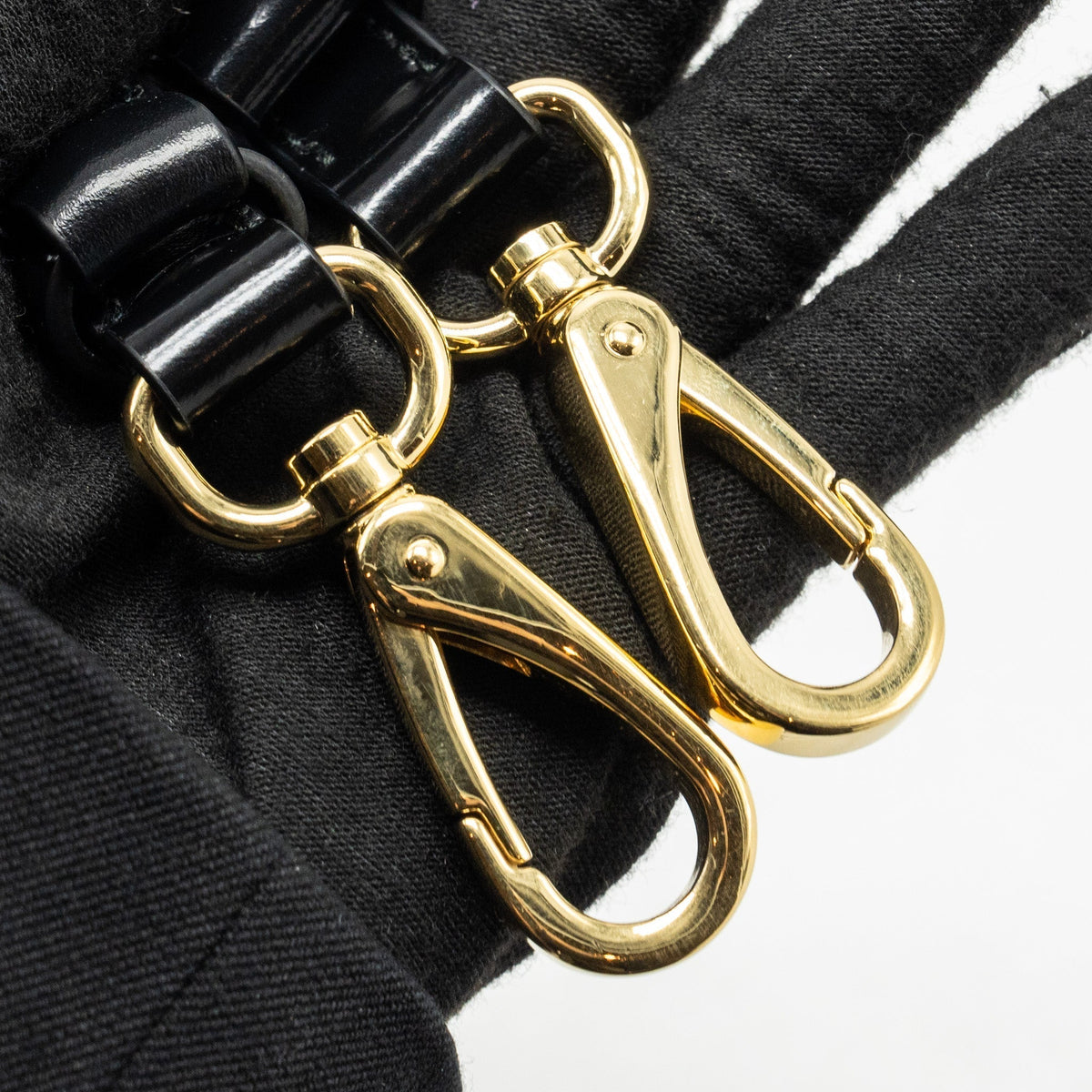 prada-re-nylon-mini-bag-nylon-calfskin-black-ghw