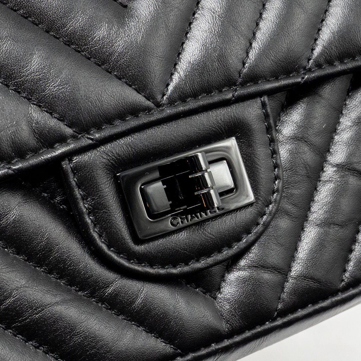 chanel-mini-2-55-reissue-flap-bag-chevron-aged-calfskin-so-black