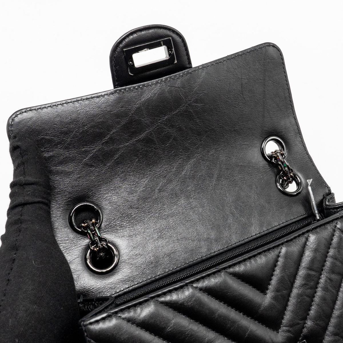 chanel-mini-2-55-reissue-flap-bag-chevron-aged-calfskin-so-black