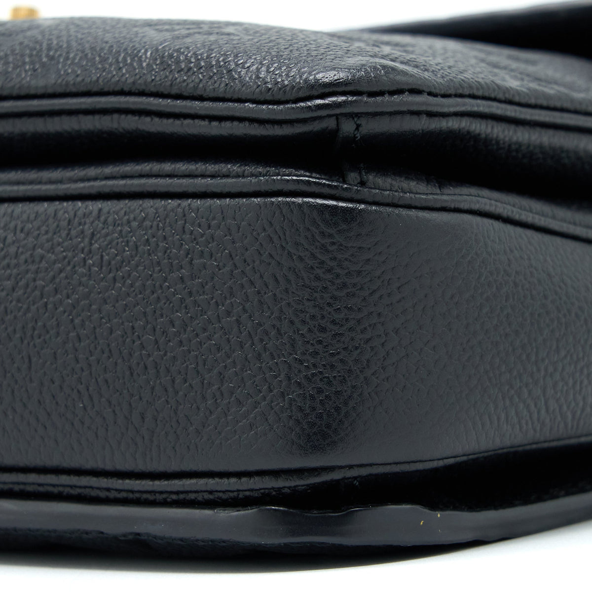 louis-vuitton-pochette-metis-monogram-empreinte-leather-black-ghw