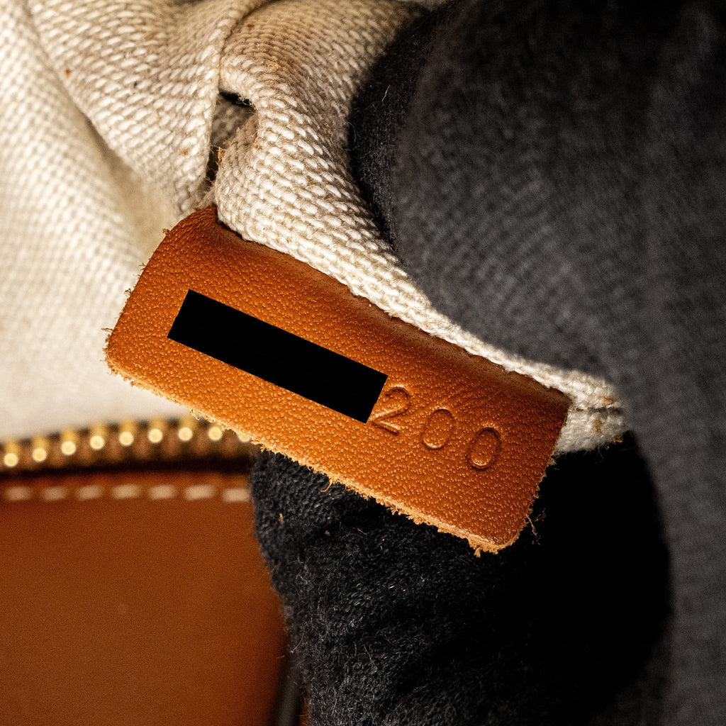 celine-vertical-cabas-tote-in-triomphe-denim-leather-navy-tan-ghw-copy