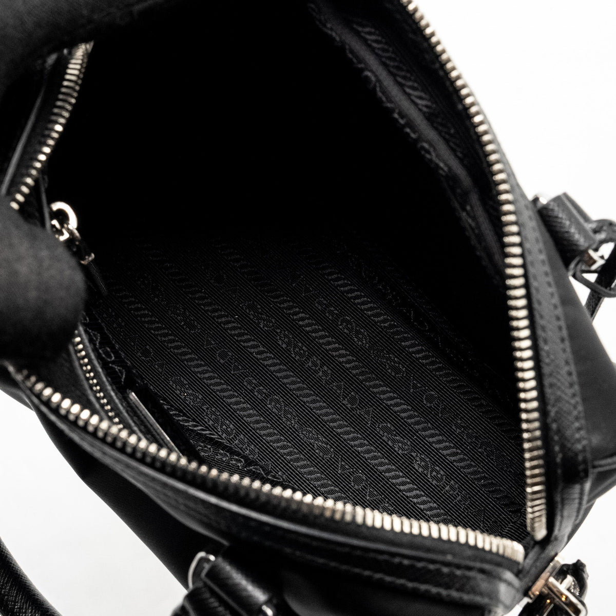 prada-top-handle-re-edition-2005-nylon-bag-black-shw