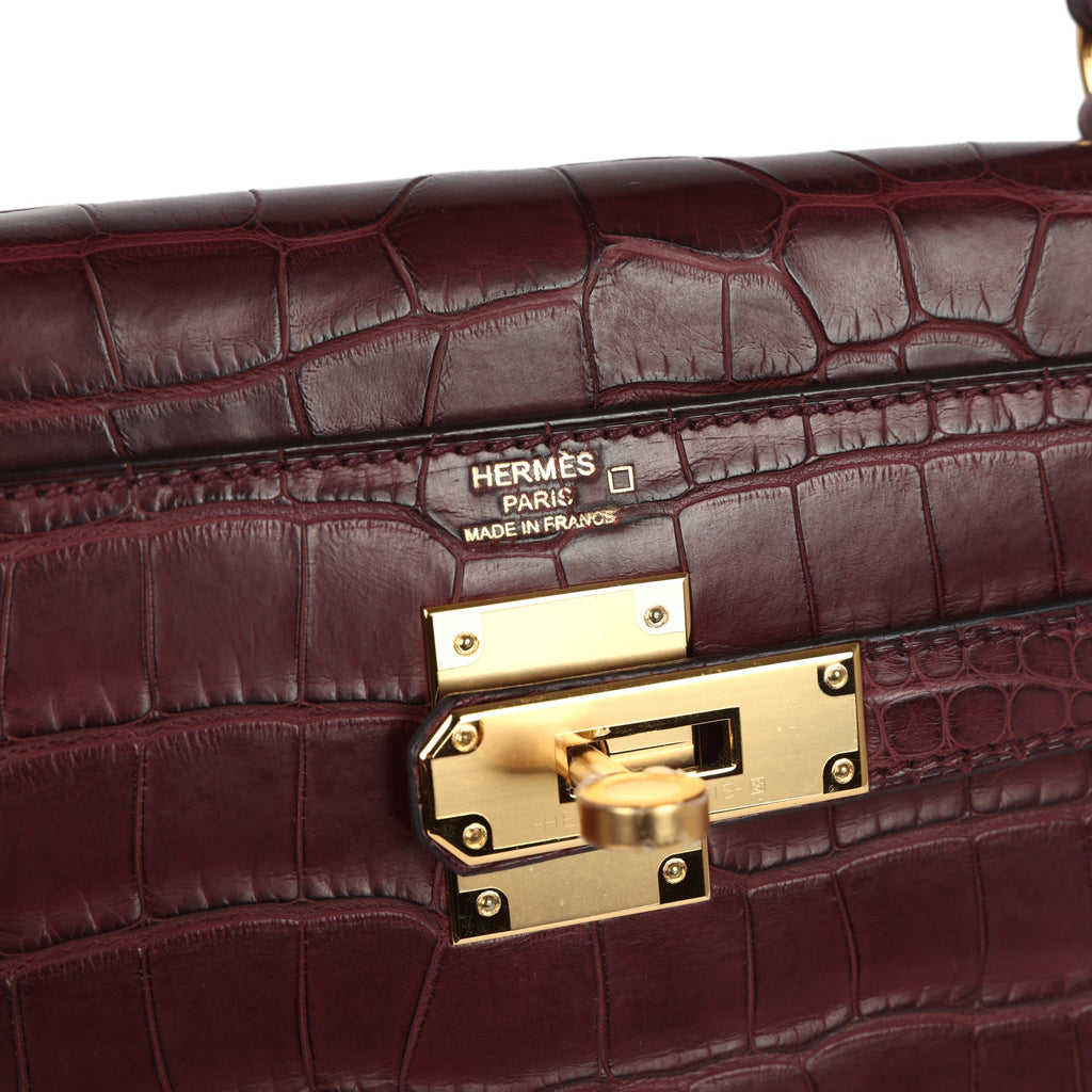 hermes-kelly-retourne-28-bordeaux-matte-alligator-gold-hardware-bag